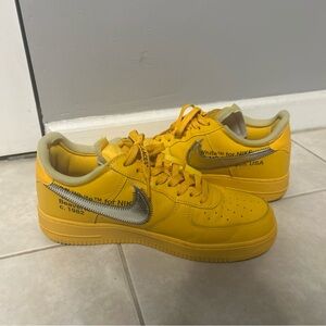 Nike Yellow Sneakers with Silver Accents
